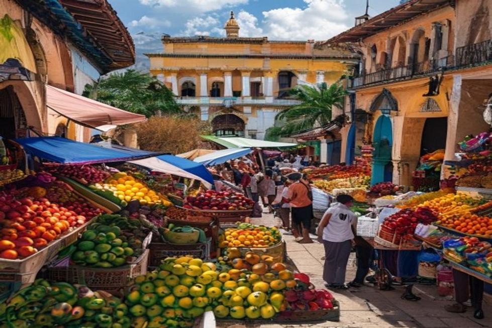 Lively market scene in Salvador with colorful fruits and vendors.